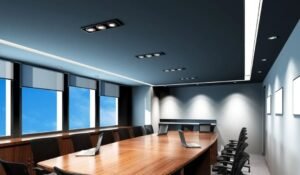 Professional installation of a modern white gypsum false ceiling with seamless LED cove lighting in a Dubai office.